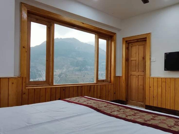 A Diwan Sachpass room in Bairagarh, its window looking over the valley